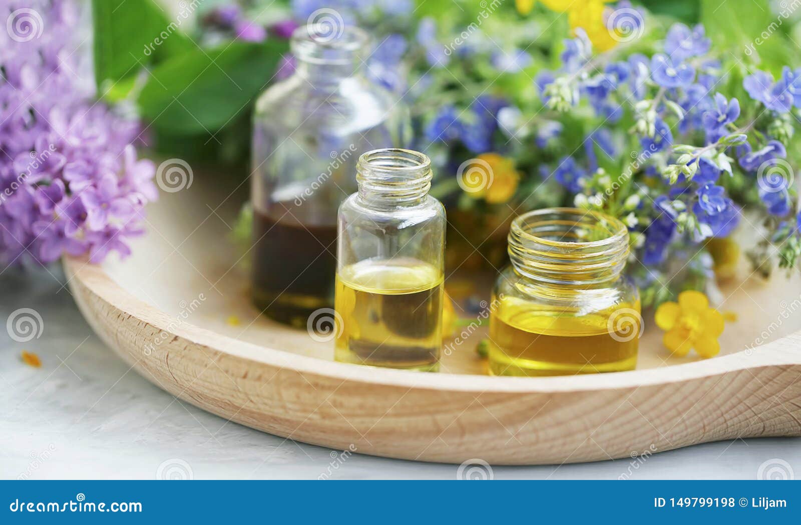 aromatherapy. natural medicinal plants and herbs oil bottles, natural floral extracts and oils, natural oils