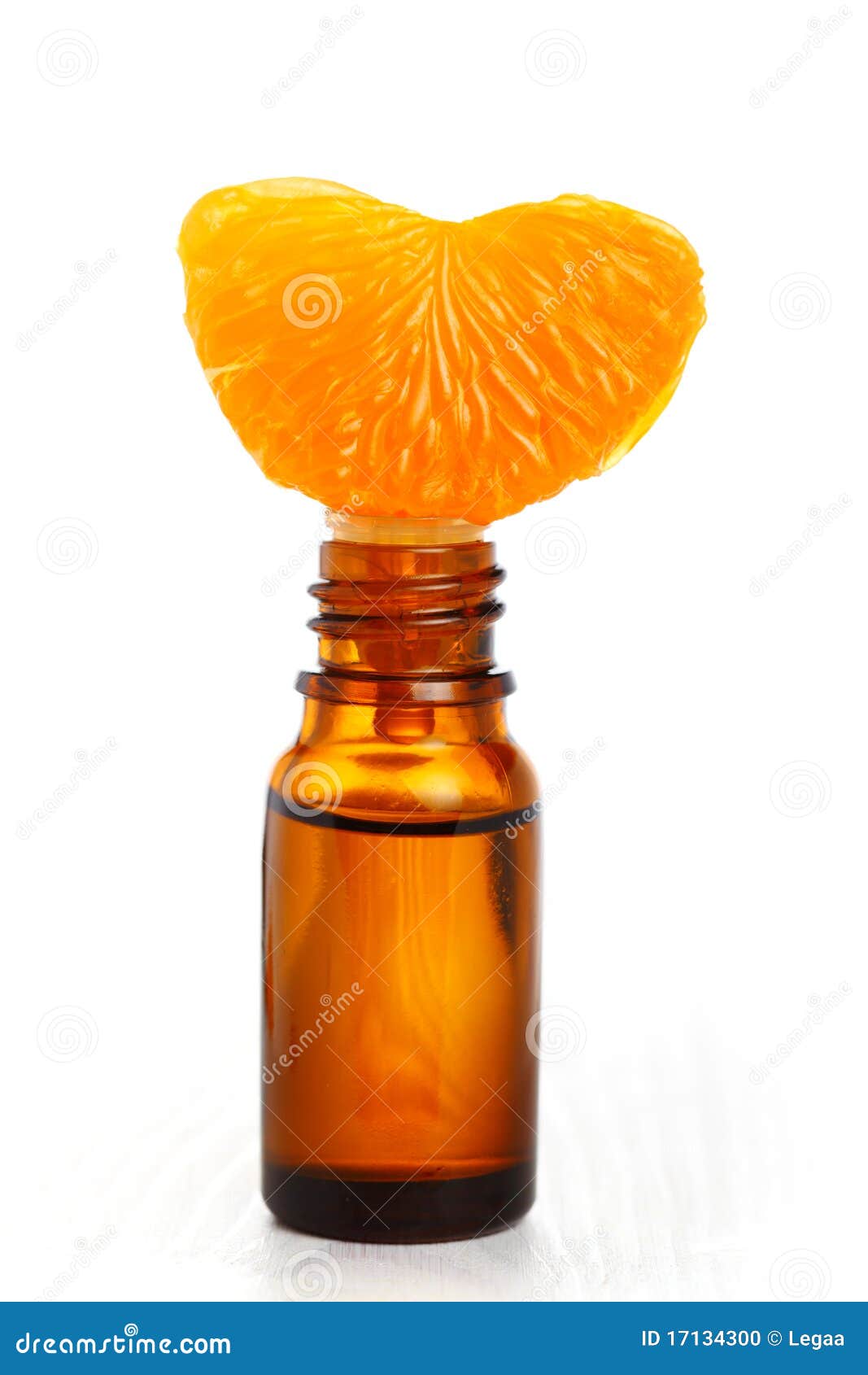aromatic essence oil and fresh orange segment