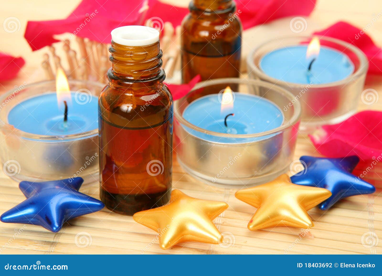 Aromatic oil and candles stock photo. Image of burning 18403692