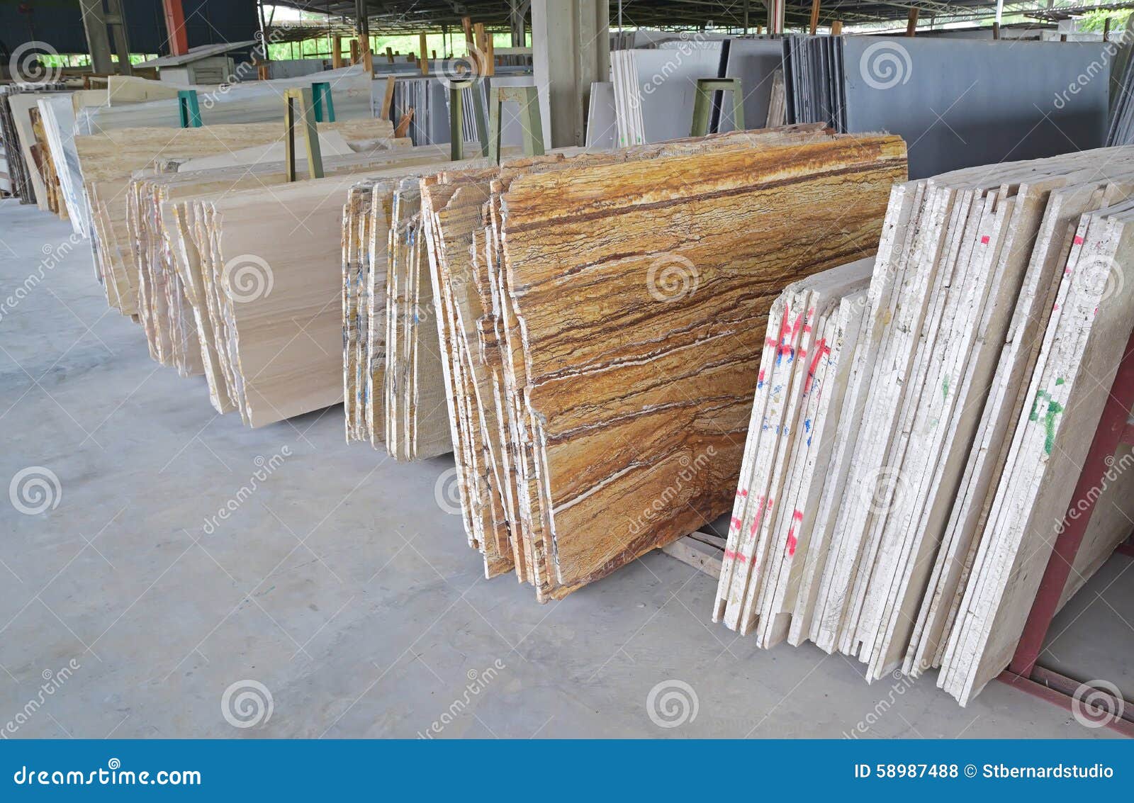 An Array of Different Natural Stones in a Warehouse Stock Photo Image