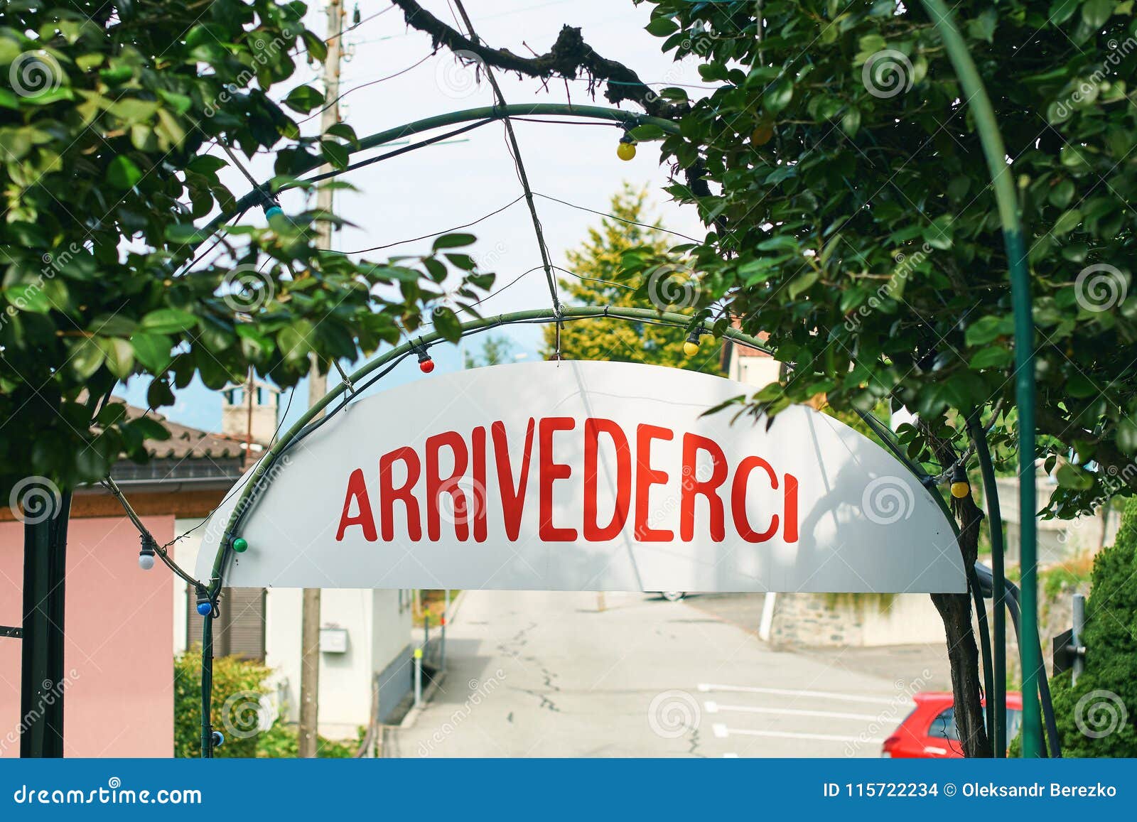 Arrivederci or Goodbye Sign in Italian Language in Rural Switzerland