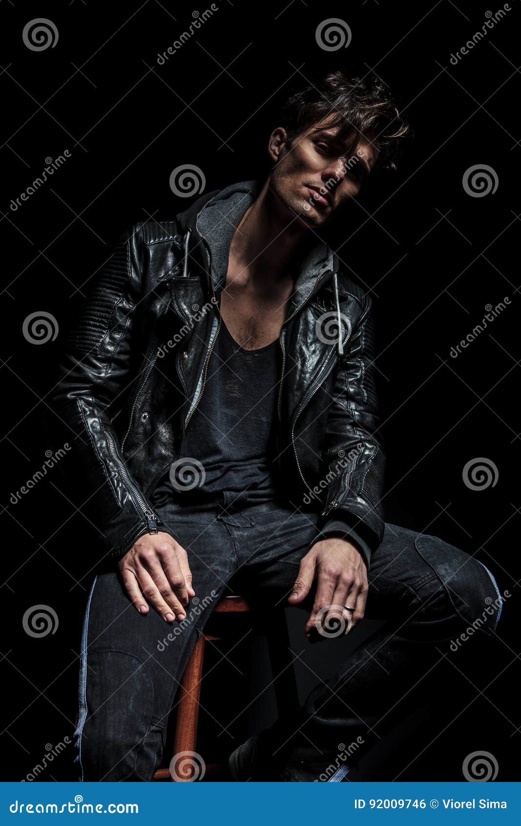 Arrogant Man in Leather Jacket Looking Down You Stock Photo - Image of ...