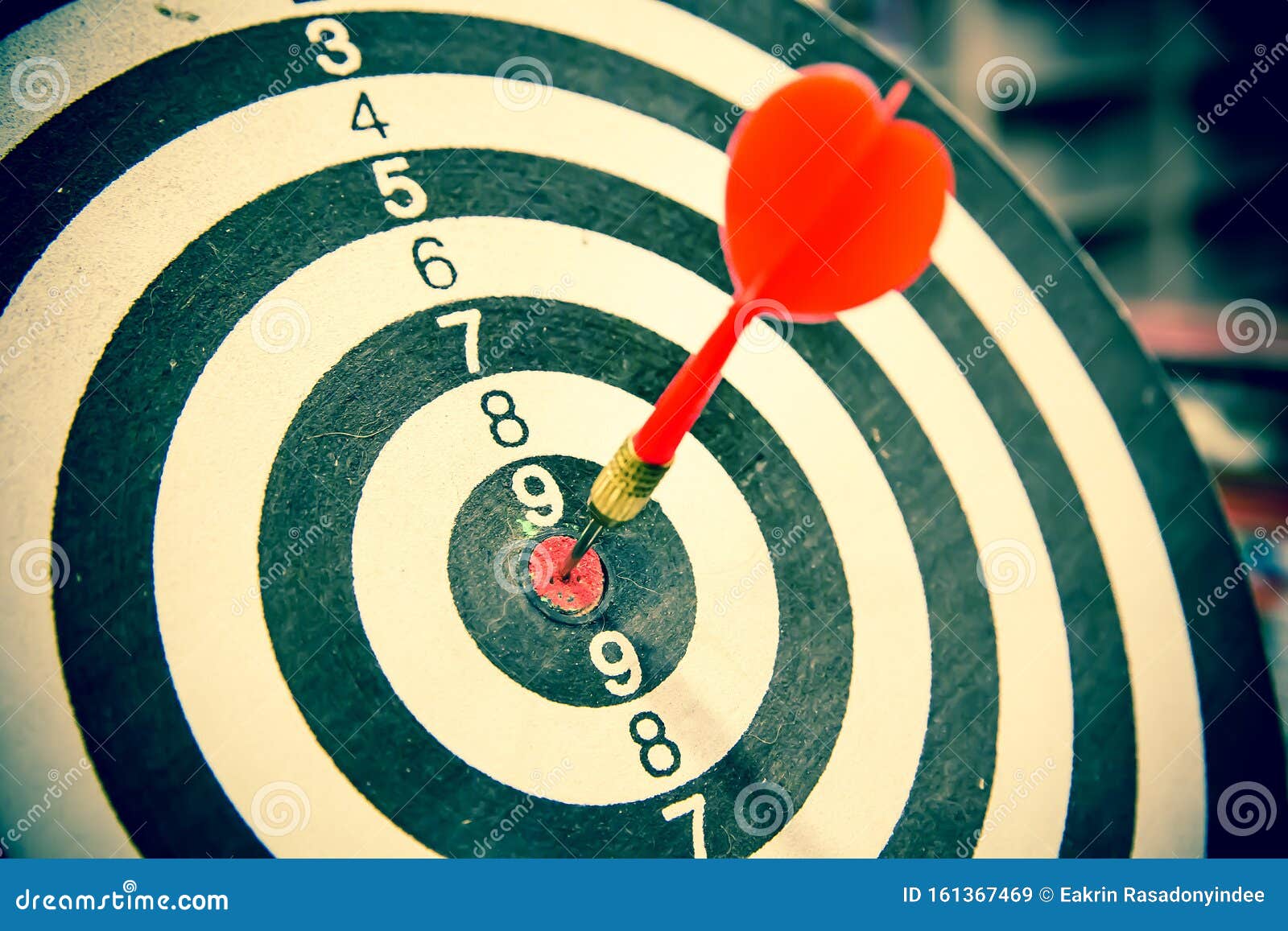 Arrow Hitting in the Target Center of Bullseye Stock Image Image of