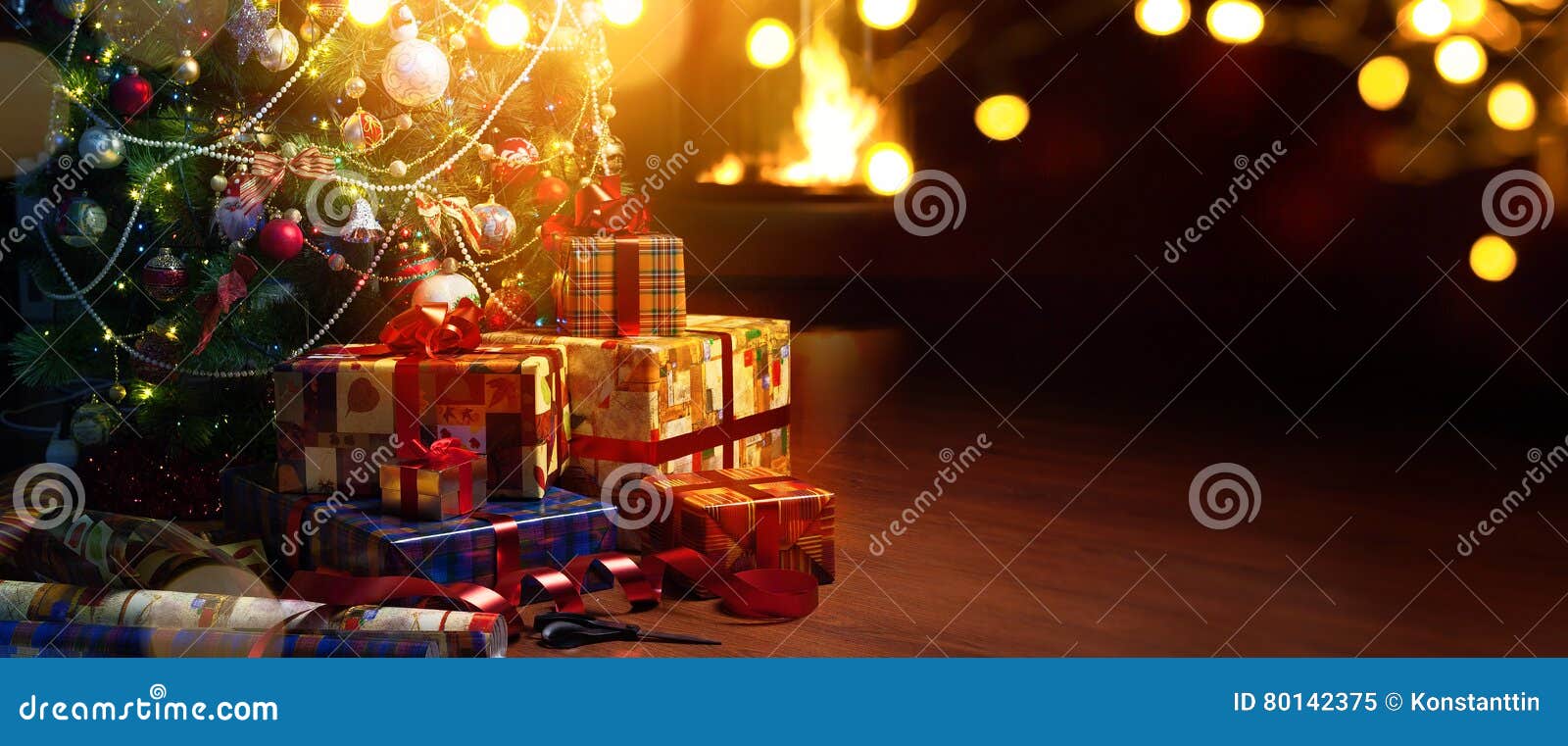 art christmas tree and holidays present on fireplace background