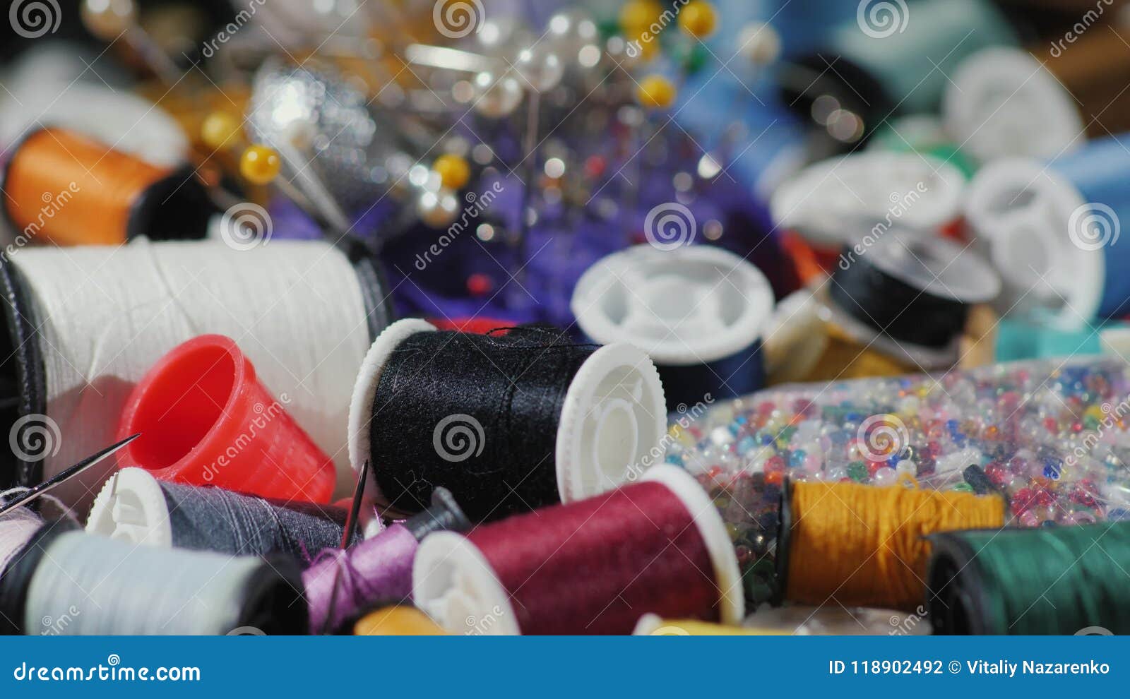 The Art of Needlework. Background with Threads, Needles and Other