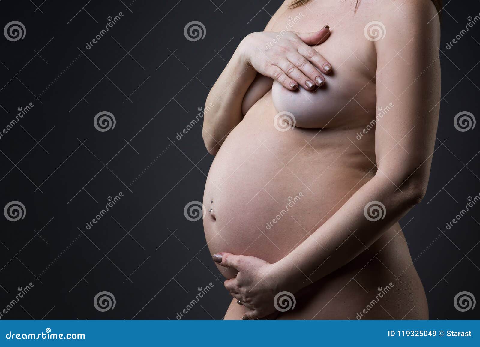 Embrace the beauty of pregnancy nude photos of a 9 month pregnant woman pic