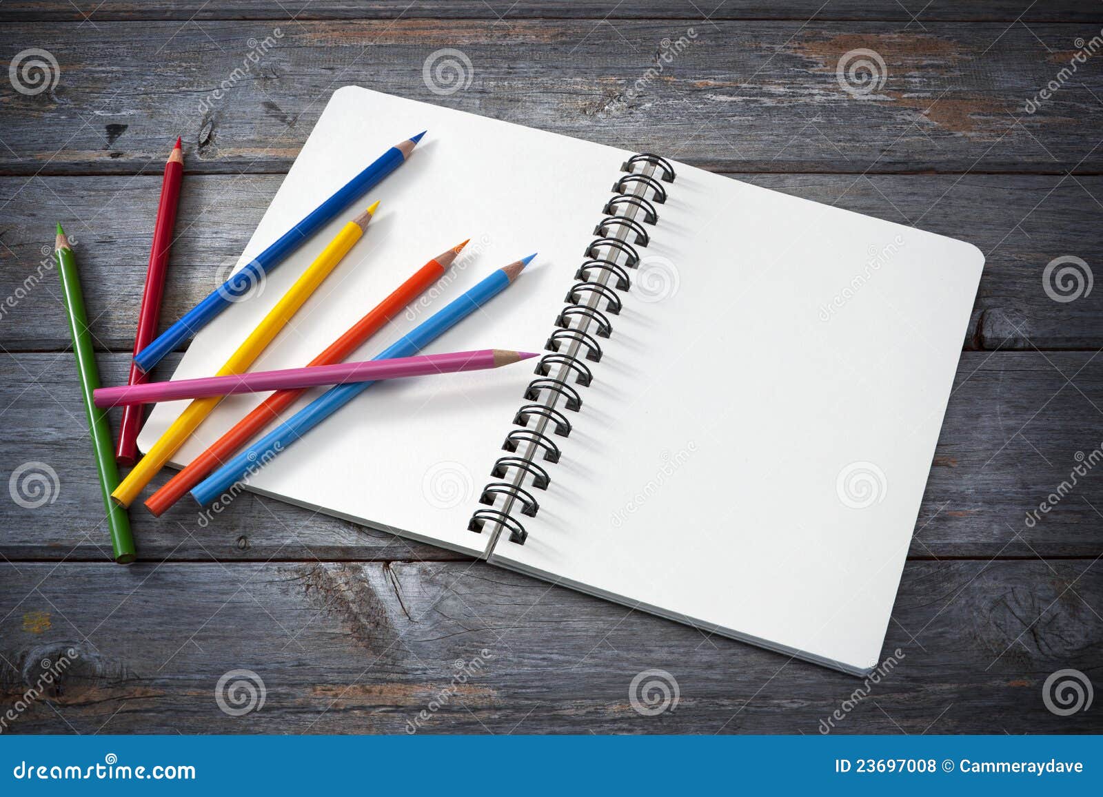 Premium Photo  Close-up view of artist's or designer's table. pencils,  sharpner and eraser laying on sketch book with hand-drawn feathers