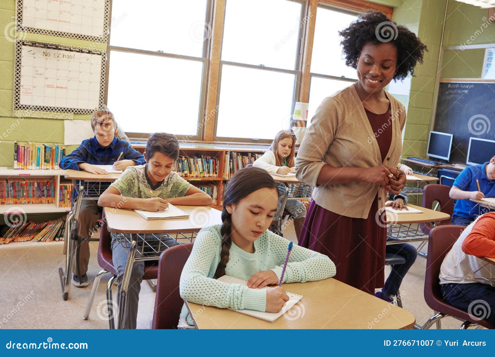 The Art of Teaching is the Art of Discovery. a Teacher in a Classroom