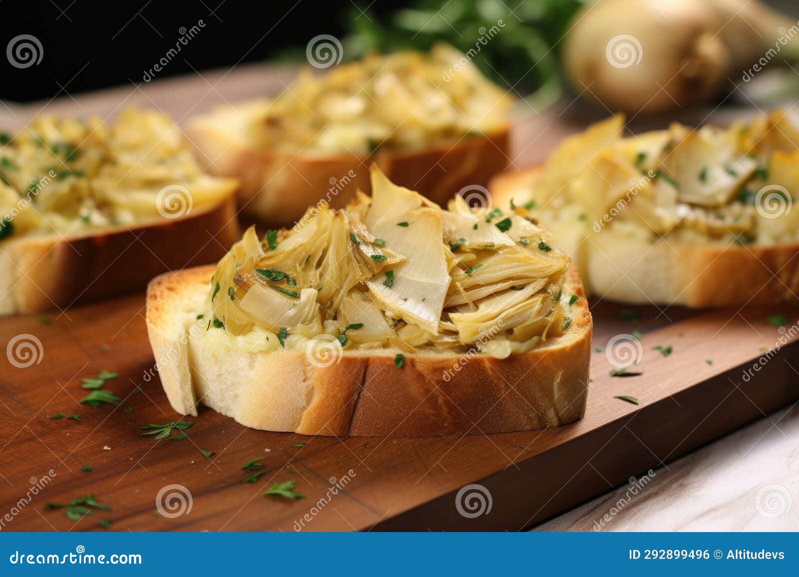 Artichoke Hearts Cooked and Spread on a Toasted Bread Slice Stock Photo