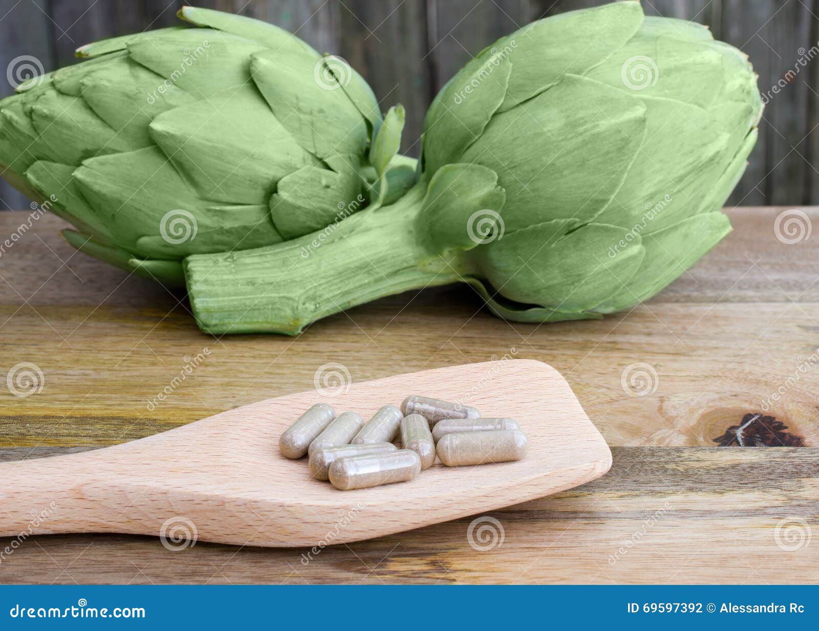 Artichokes and supplements stock photo. Image of pill 69597392