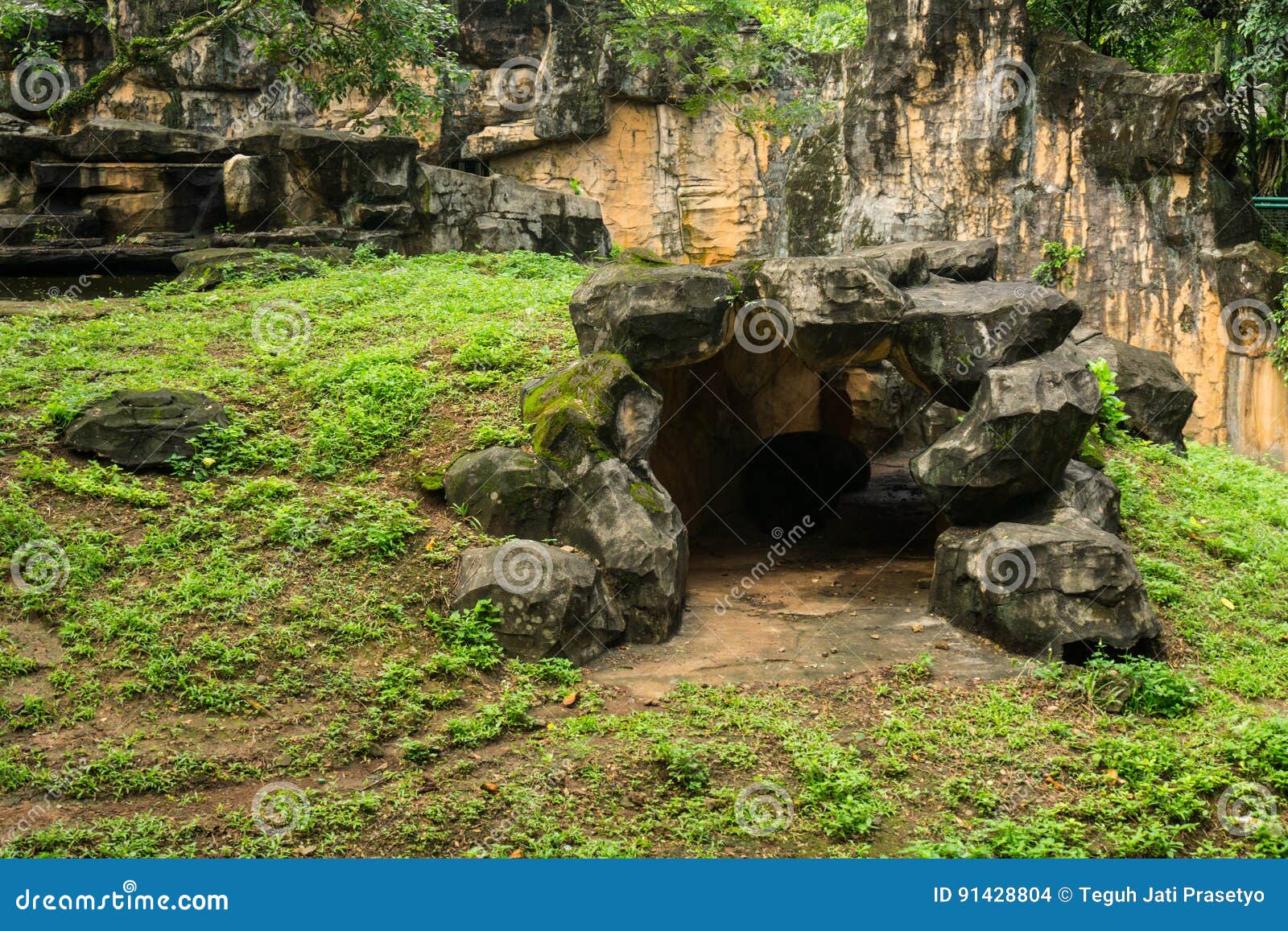 An Artificial Cave Made from Cement with Hill and Cliff Photo Taken in