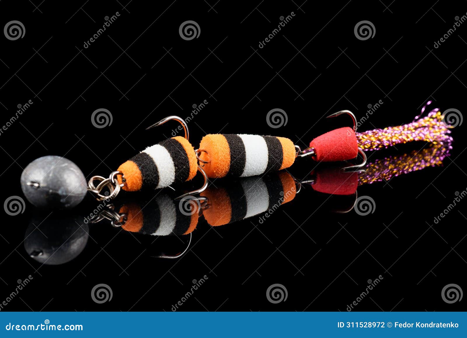 https://thumbs.dreamstime.com/z/artificial-fishing-bait-predatory-fish-shot-black-surface-reflection-311528972.jpg