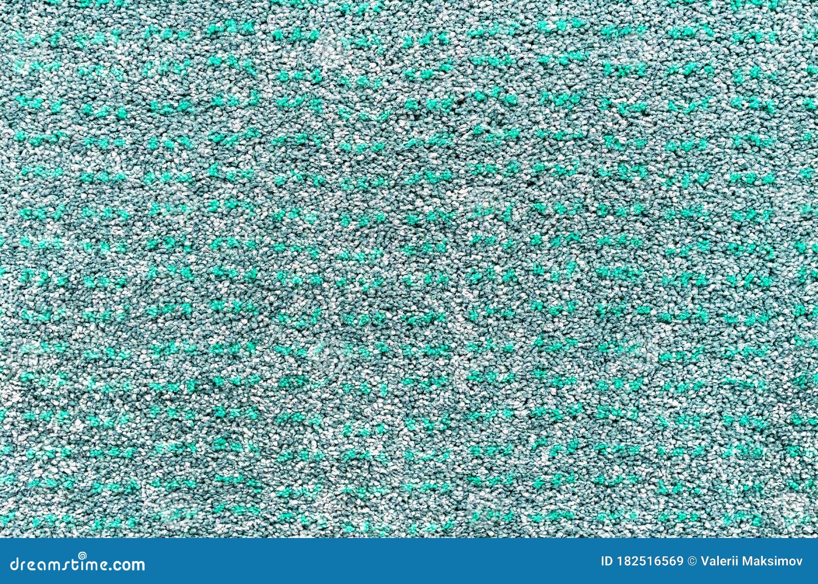 Artificial Green Rug with a Short Pile. Background from a Green Carpet