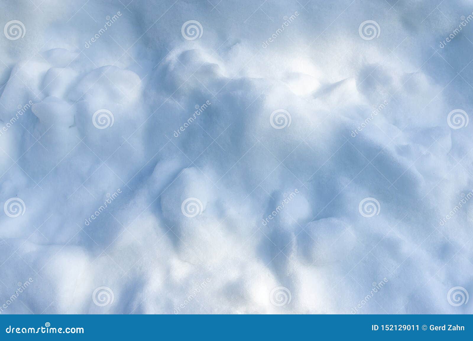artificial ice, snow created by planing and preparing an ice surface with an ice-working machine
