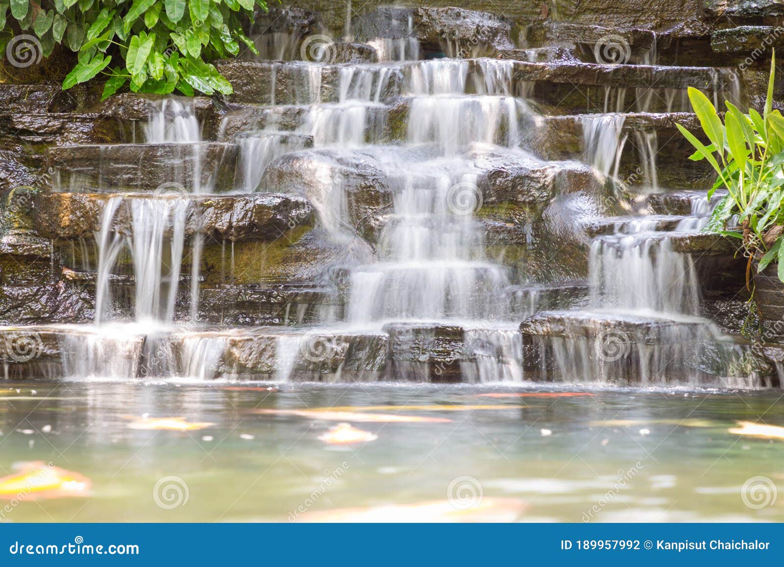 Artificial Water Fall In The Garden Artificial Pond With A Waterfall In A Landscape Design A Small Artificial Waterfall Surround Stock Photo Image Of Decoration Nature 189957992