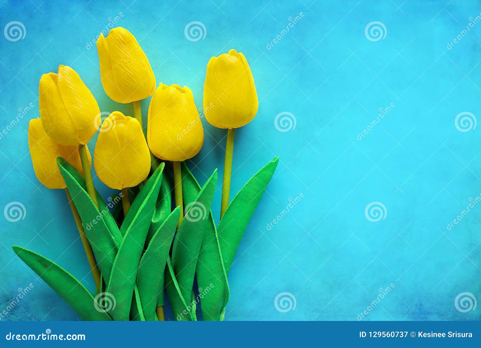 Artificial Yellow Tulips on Blue Background Stock Image Image of stem
