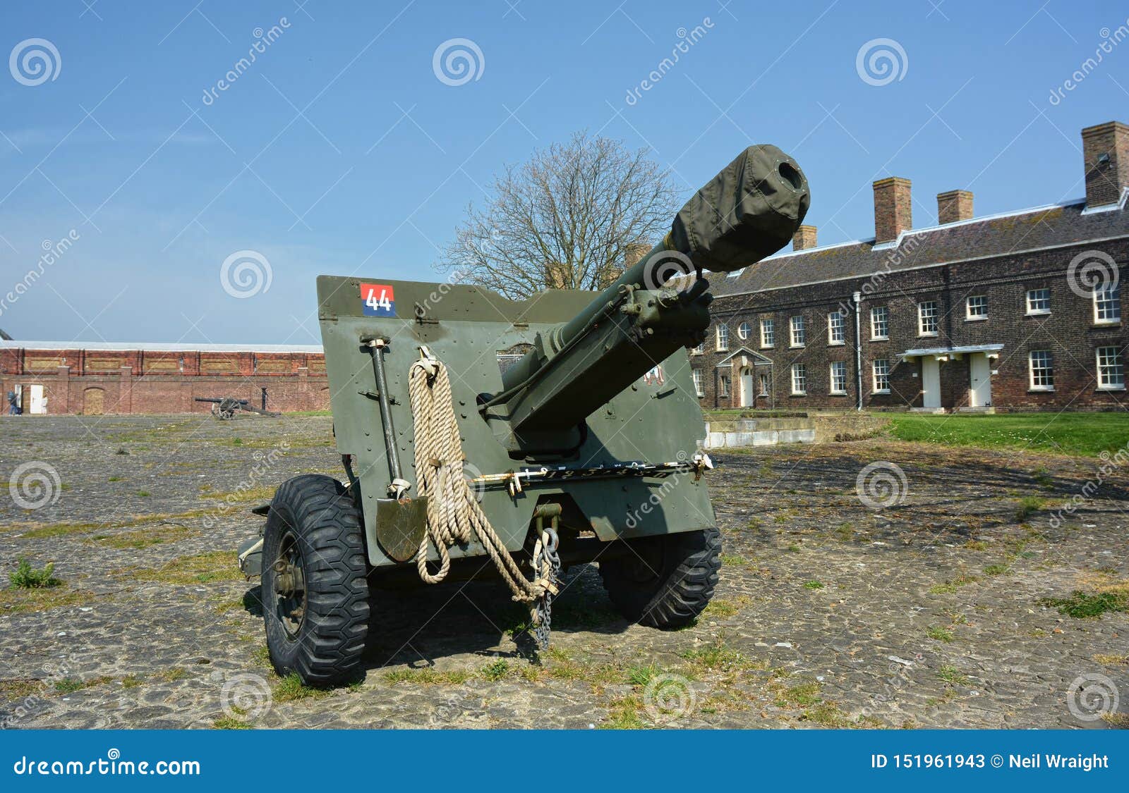 Artillery gun on displayon parade ground. Tilbury Fort. UK. 2nd world war artillery gun on display at Tilbury Fort in the UK. Tilbury Fort on the Thames estuary has protected London seaward approach from the 16th century through to the Second World War.nHenry VIII built the first fort here, and Queen Elizabeth I famously rallied her army nearby to face the threat of the Armada. The present fort is much the best example of its type in England, with its circuit of moats and huge parade ground.