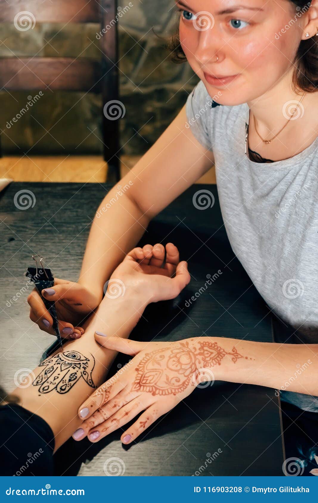 Artist Applying Henna Mehndi Tattoo on Female Hand Stock Photo - Image of luck, apply: 116903208 Artist Applying Henna Mehndi Tattoo on Female Hand Stock Photo - Image of luck, apply: 116903208