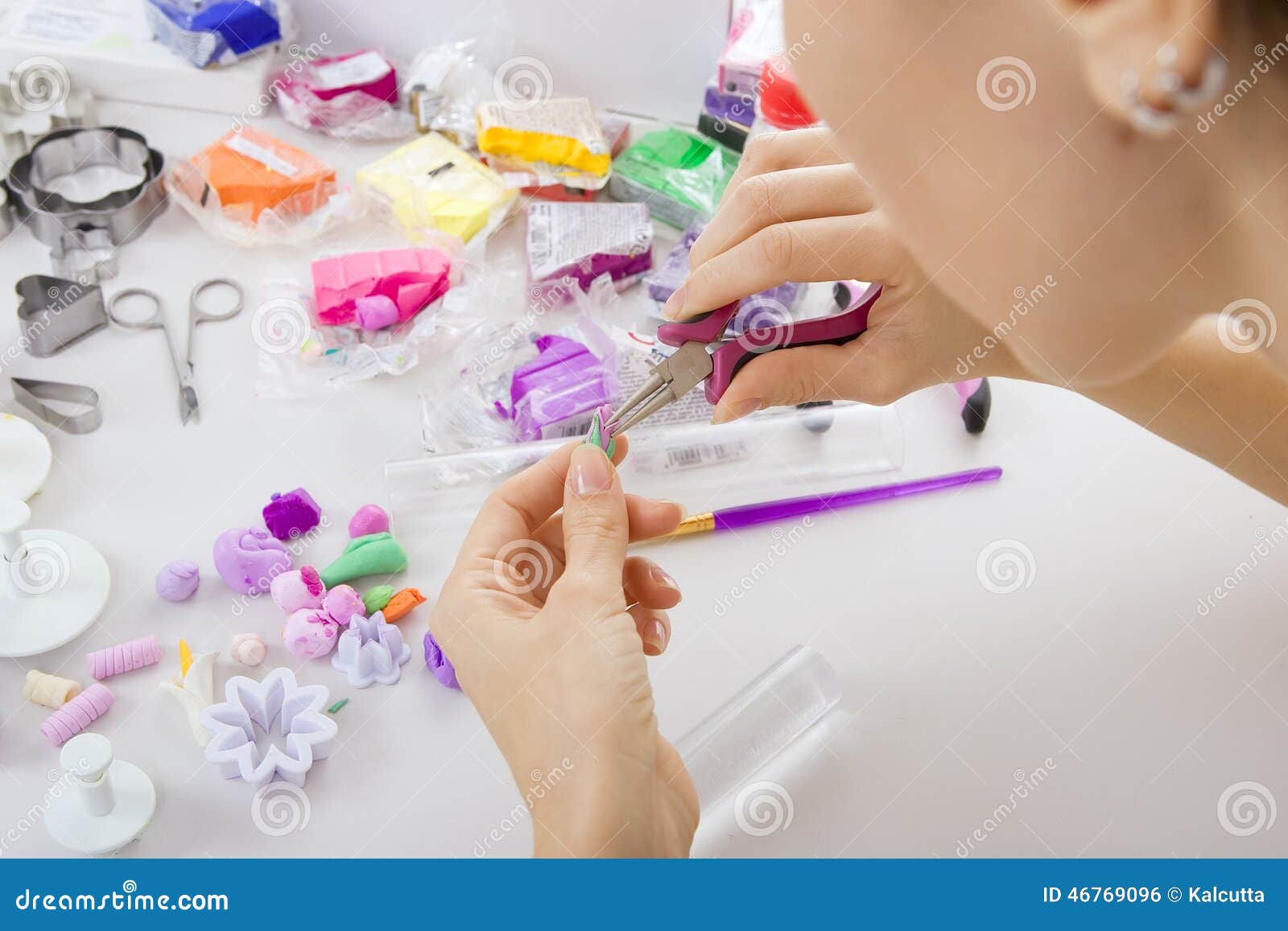 Artist Makes Jewelry from Polymer Clay, Process. Stock Photo