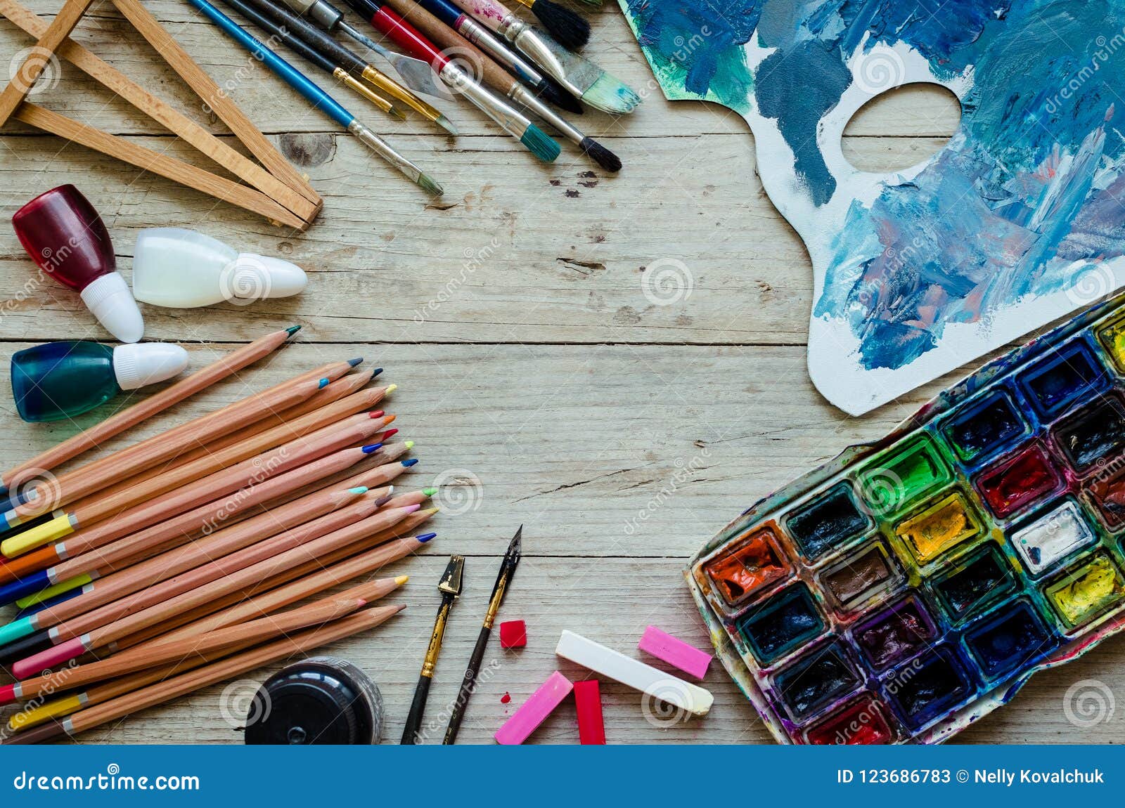 Artist Paint Brushes on the Wooden Background Stock Image - Image