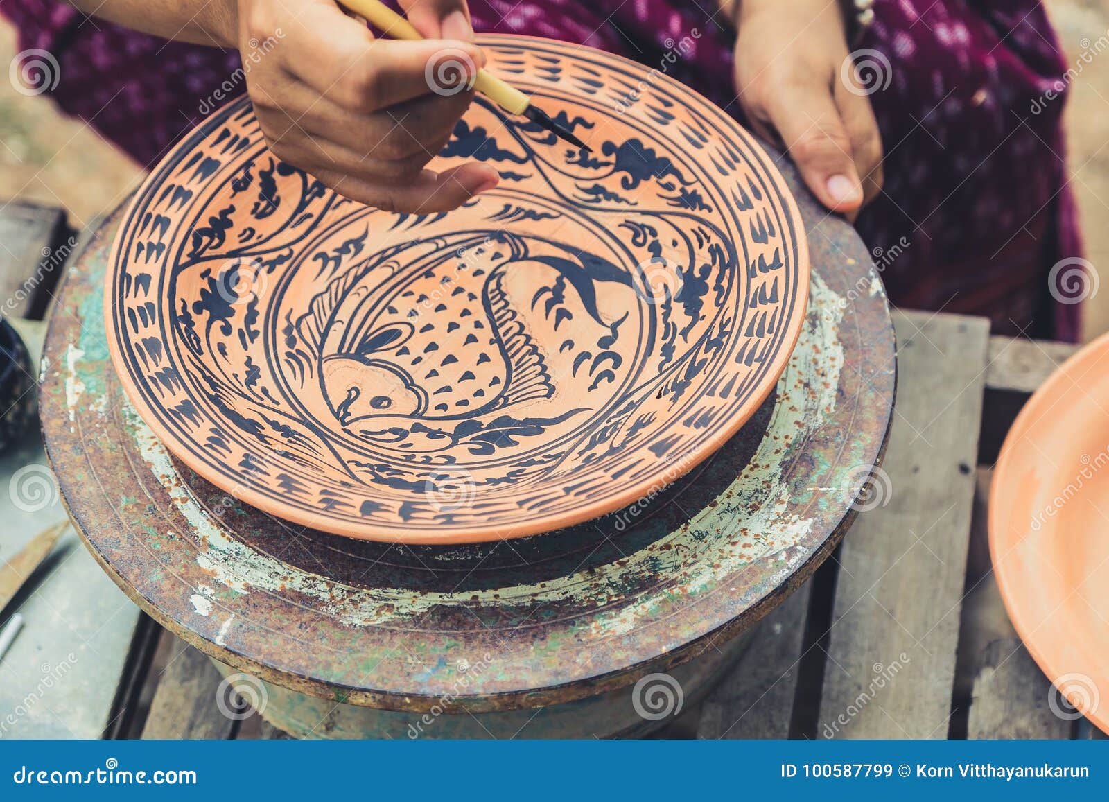 Artist Paint Drawing Fish in Sukhothai Traditional Style Stock