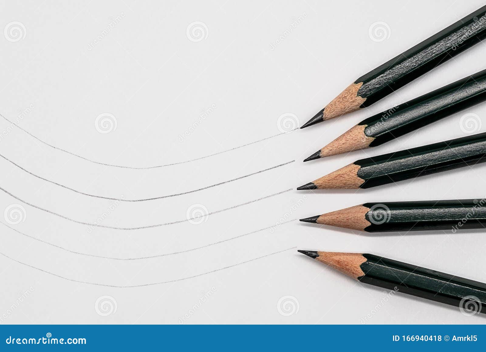 Black Pencils in Different Degrees of Hardness on White Paper Stock