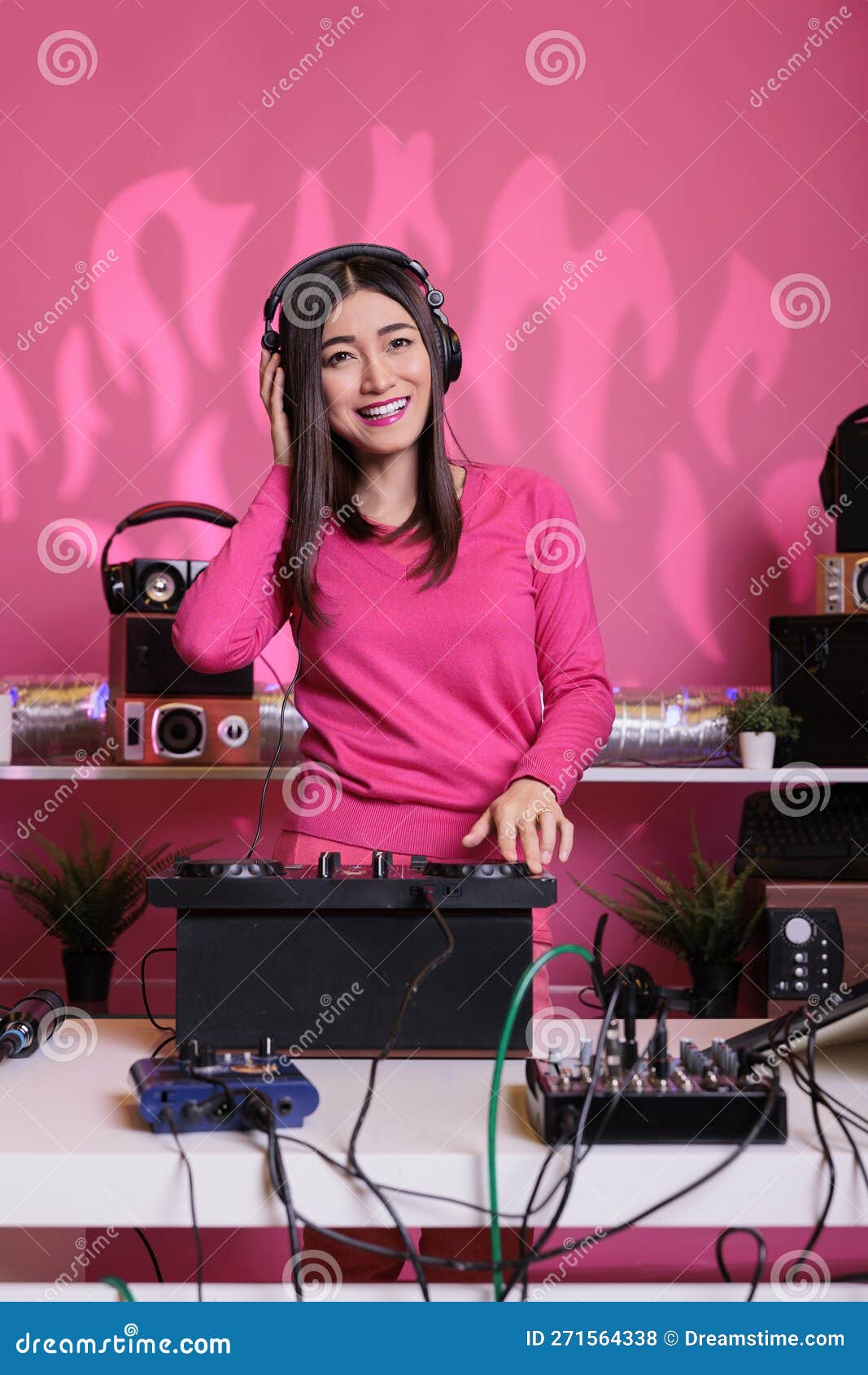 Artist Standing at Dj Table Mixing Electronic Sounds with Techno Using