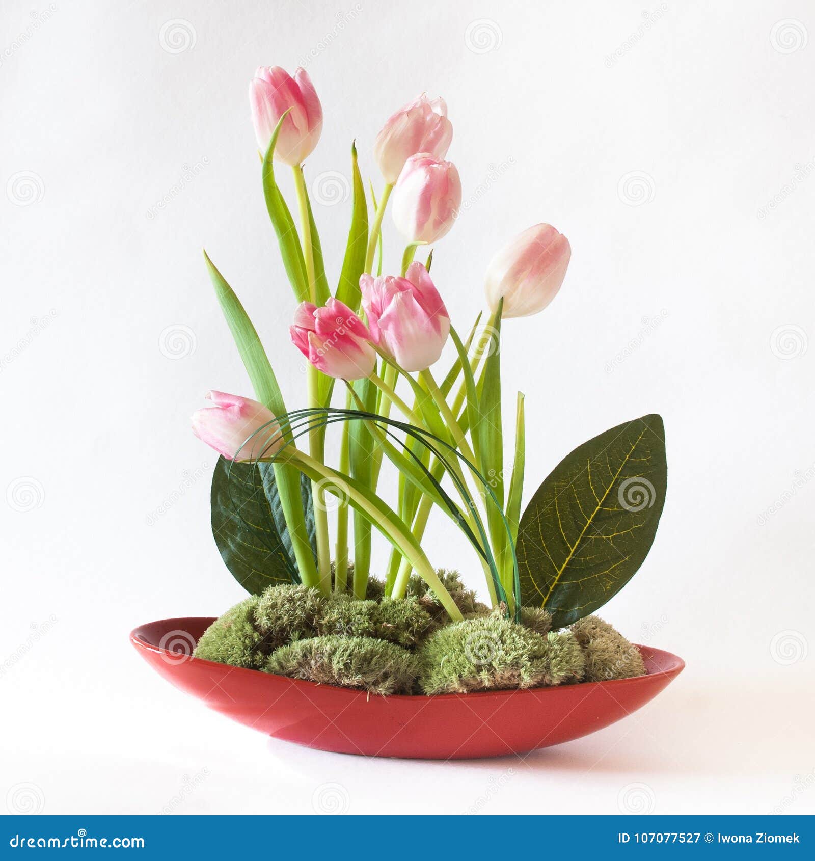 artistic flower arrangement with pink tulips