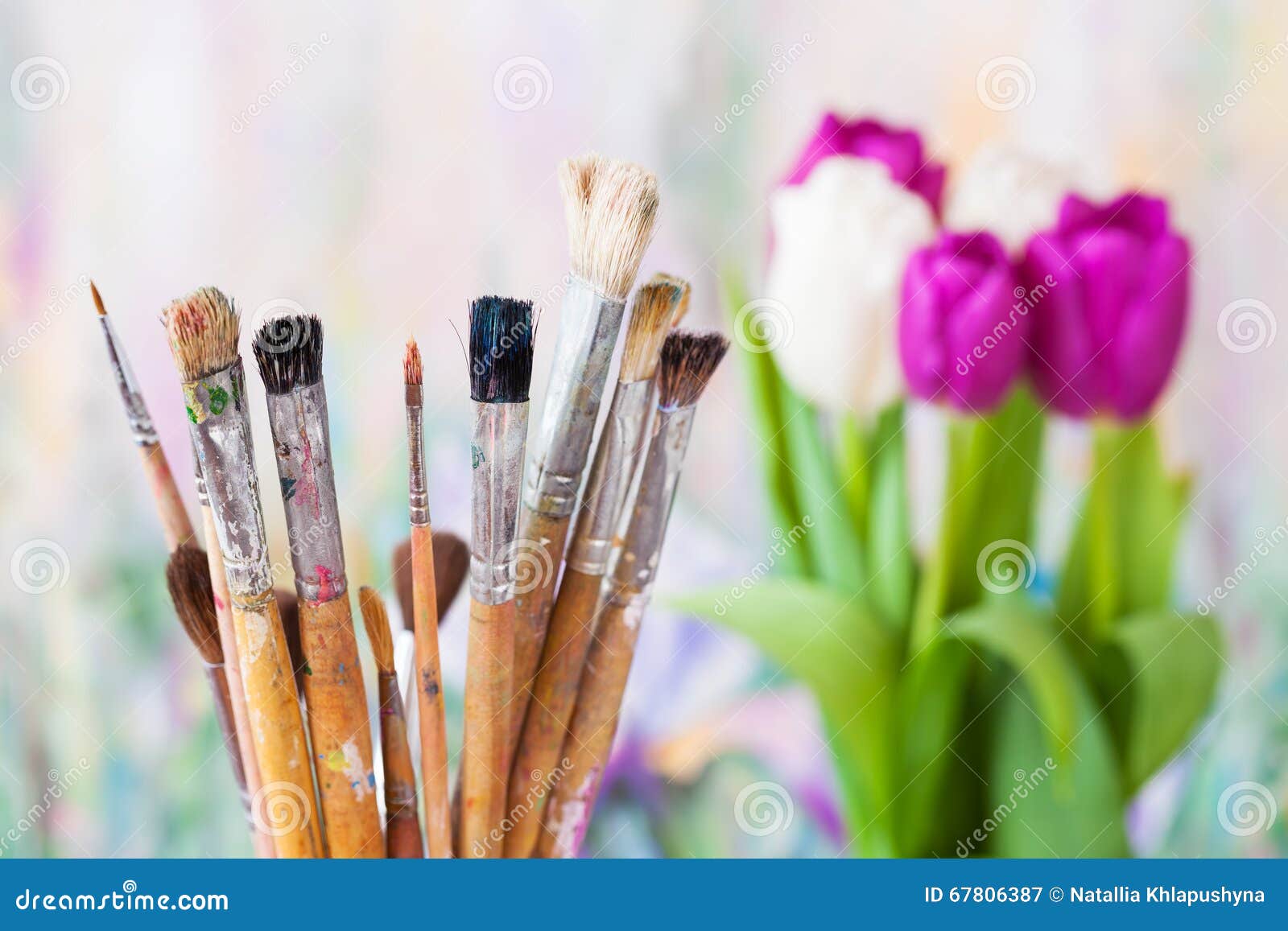Artistic Paintbrushes, Bouquet of Tulips and Painting Stock Image
