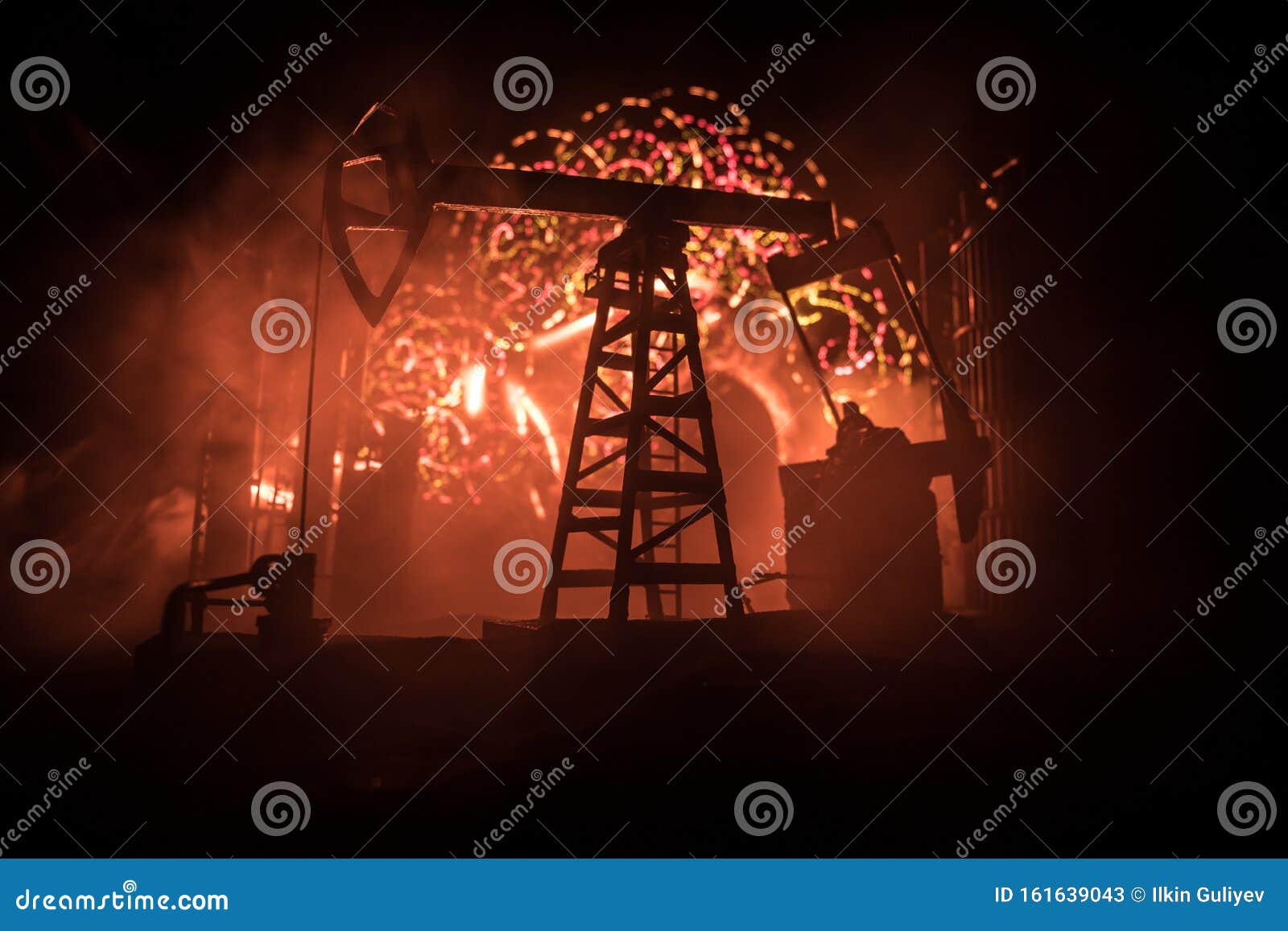 artwork decoration. oil pump and oil rig energy industrial machines for petroleum at night with fog and backlight. oil refining