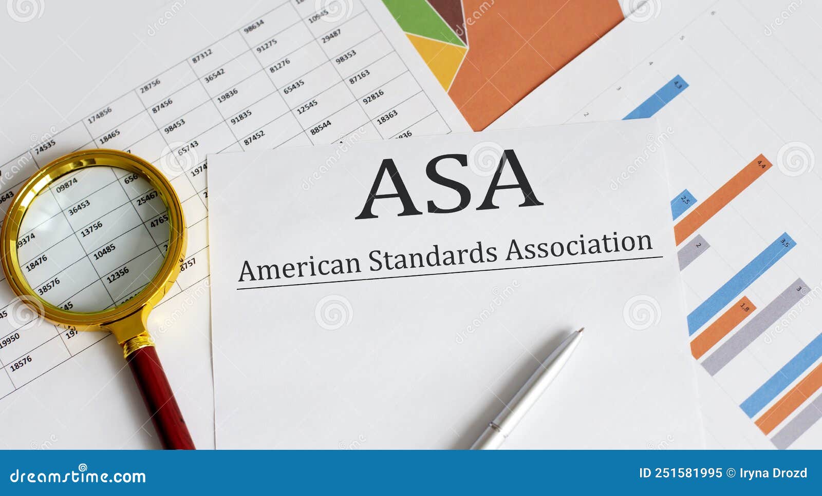 ASA American Standards Association Text with Magnifying Glass Lens on the Office Desk Table