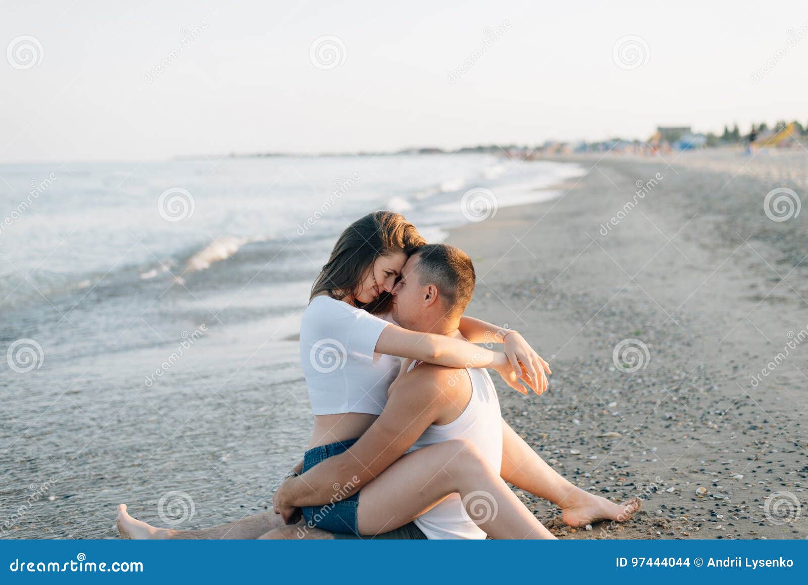 Girl Sitting On Boy Lap