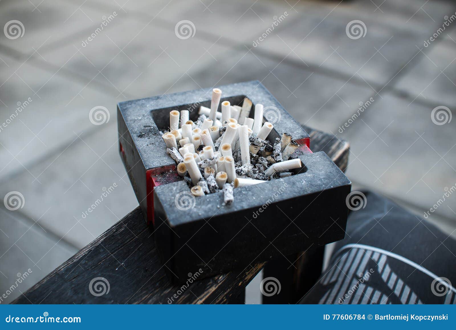 Ashtray full of cigarettes stock photo. Image of full 77606784