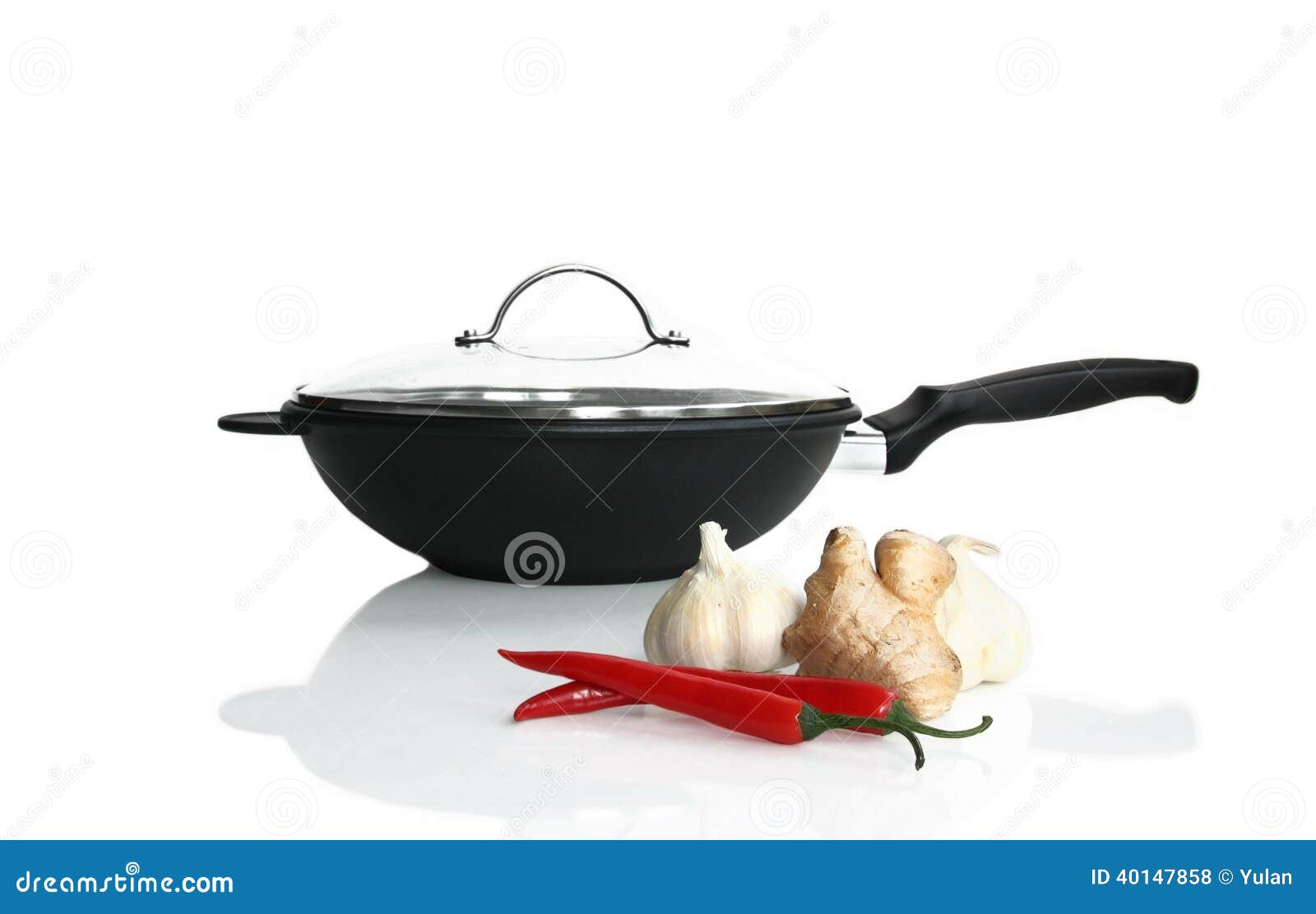 Unrecognizable man cooking in fatiscent big pan or wok in a small