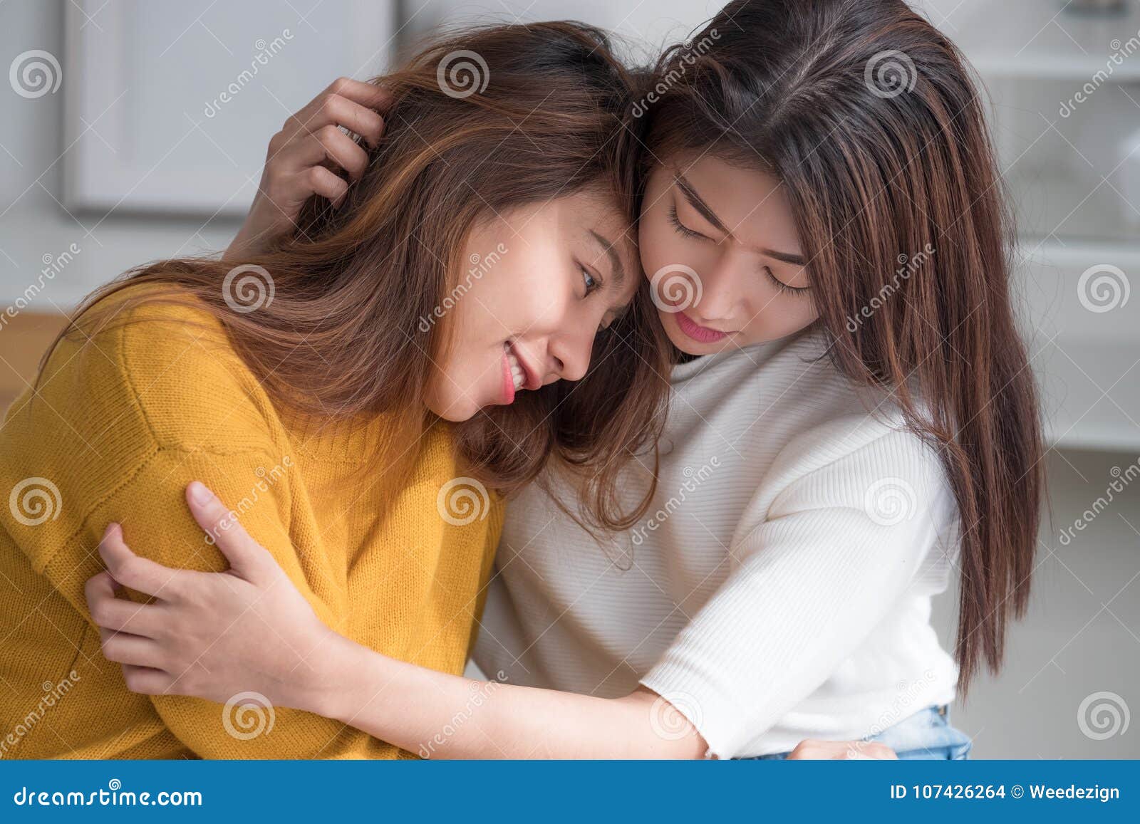 Asia Lesbian Lgbt Couple Hug And Sitting On Bed Near White Window Sunlight With Happiness Moment