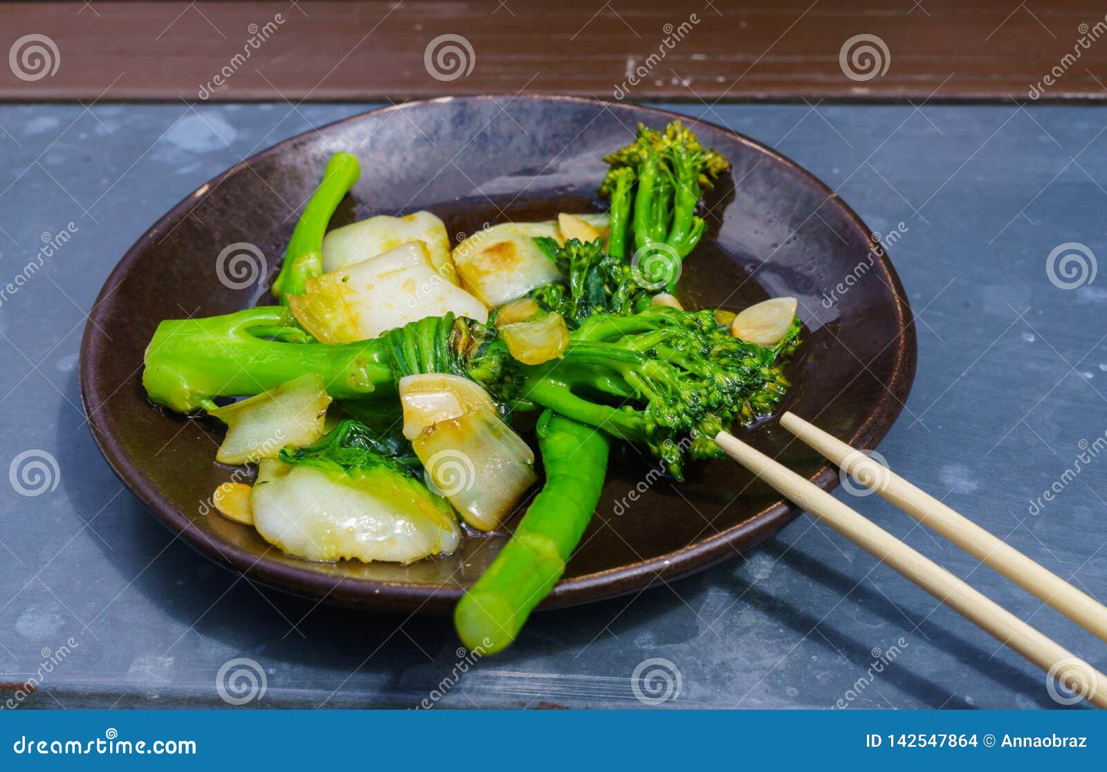 Asian Appetizer Cooked in Chinese, Chicory and Broccoli Stock Photo