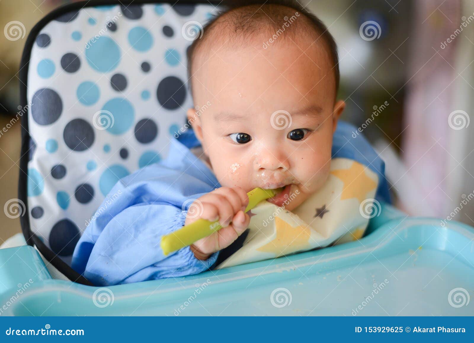 Asian Baby Boy 6 Months Old Eating by Himself with Baby Led Weaning BLW ...