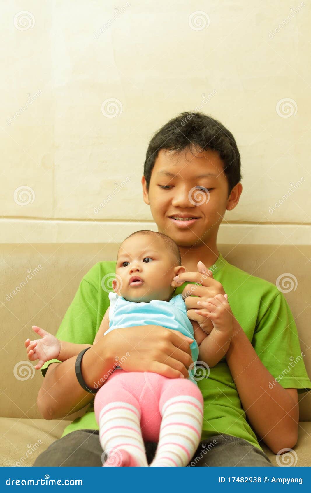 Asian boy babysit a baby stock photo. Image of babysit 17482938