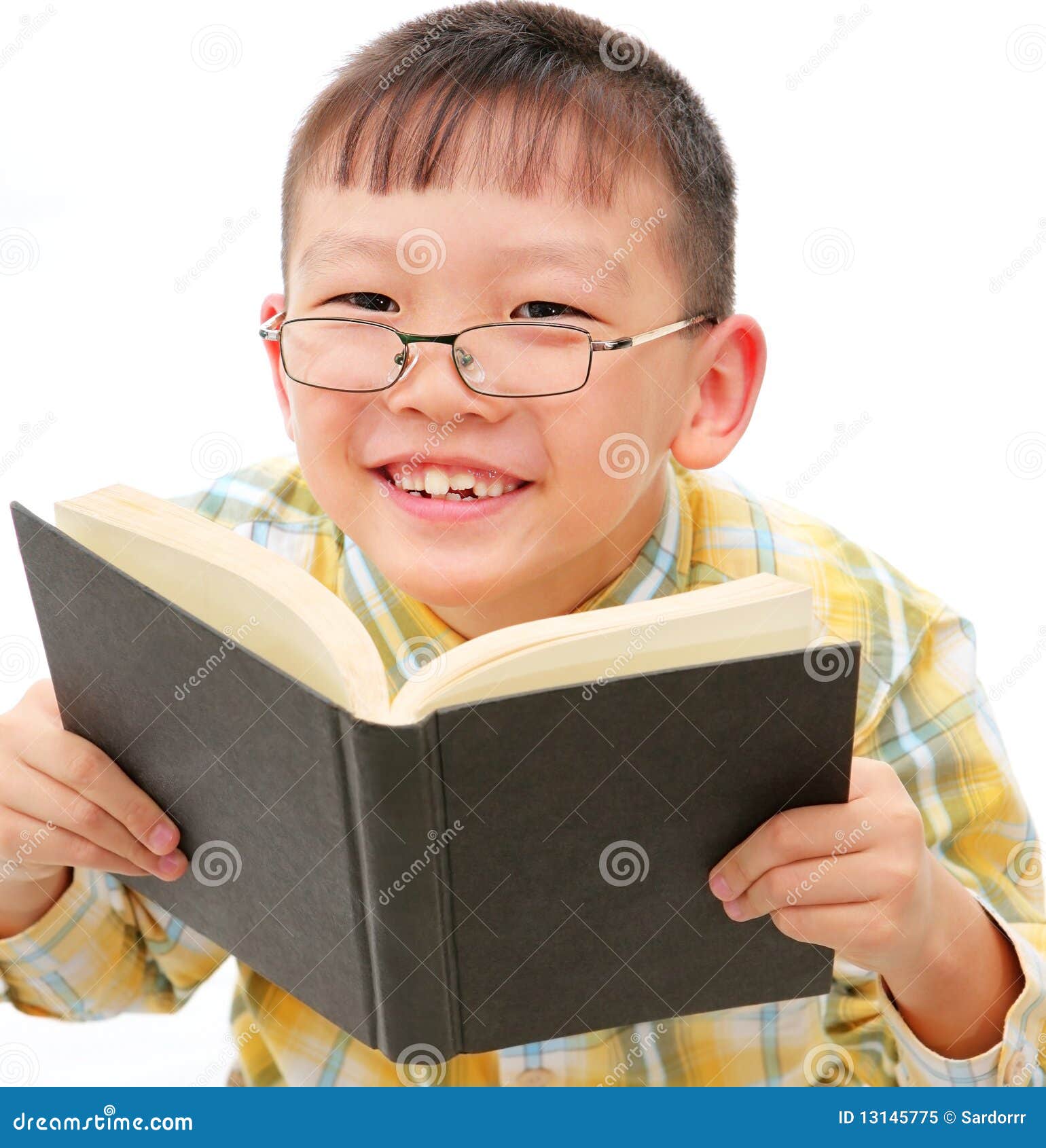 Asian Boy With Glasses Holding A Book Royalty Free Stock Photo - Image: 13145775