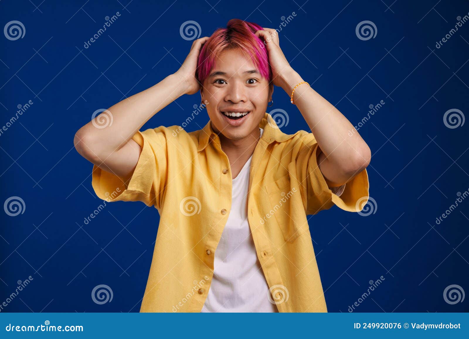 Asian Boy with Pink Hair Expressing Surprise at Camera Stock Photo ...