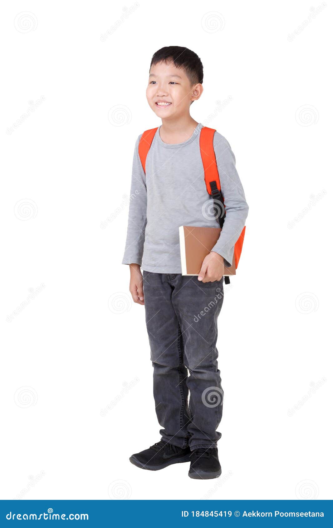 kid holding backpack