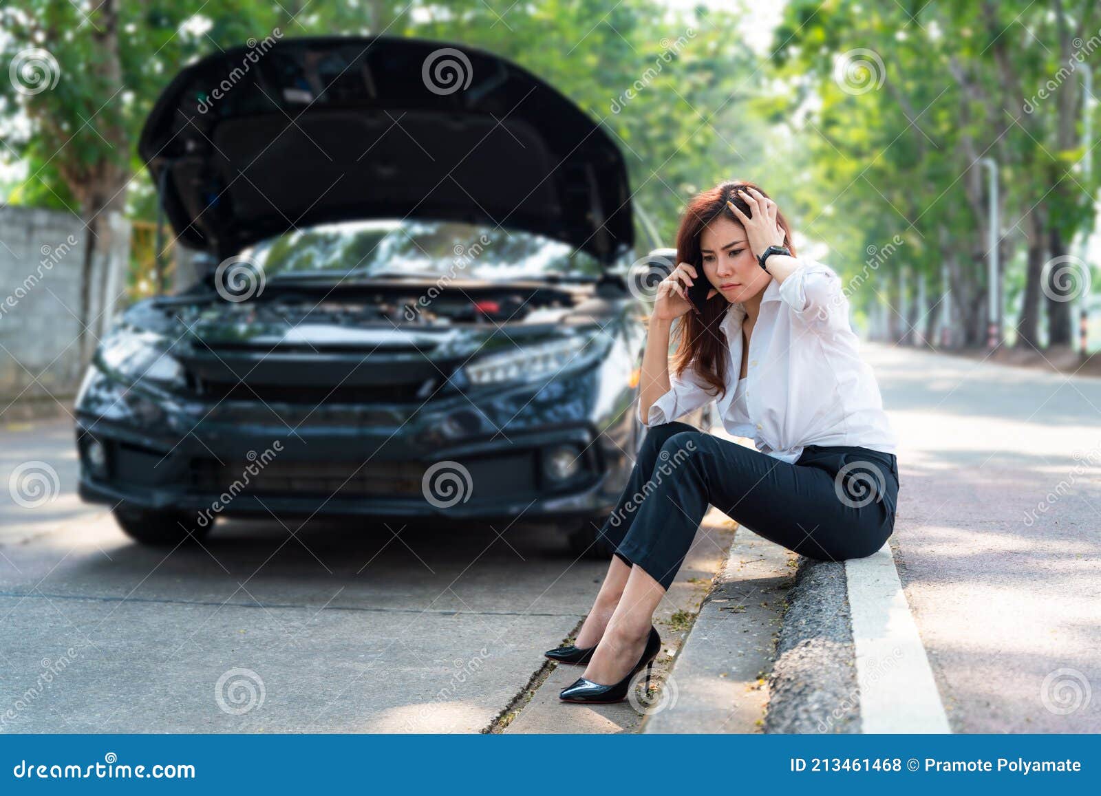 Asian Business Woman Sad Sitting Waiting For Help By A