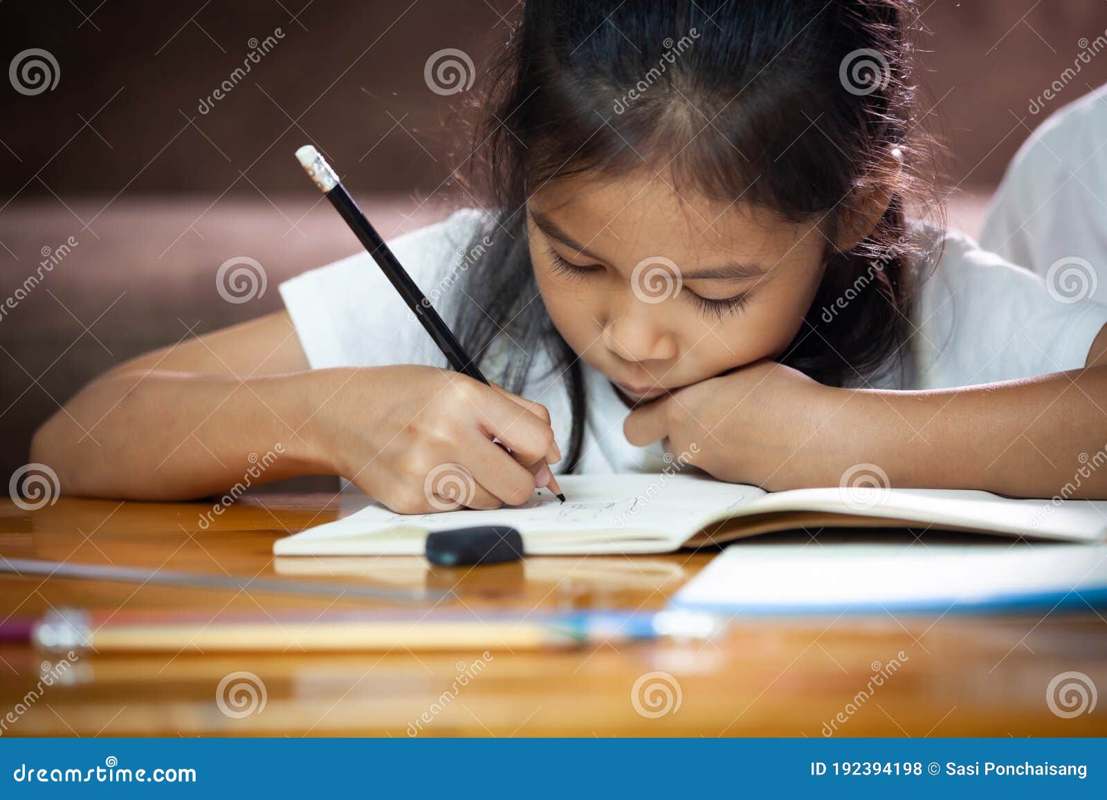 asian kid doing homework