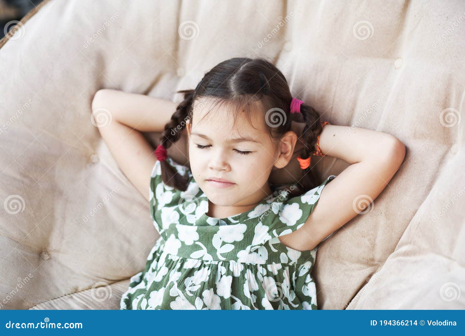 Asian Child Resting in a Chair Stock Photo - Image of light, little ...