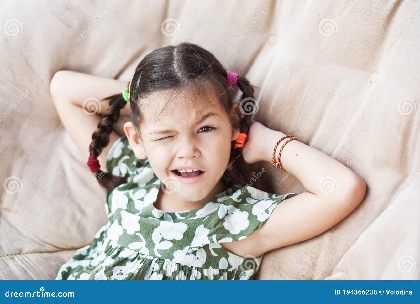 Asian Child Resting in a Chair Stock Photo - Image of dress, emotion ...