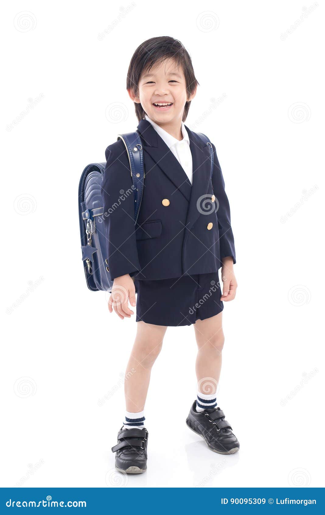 Indian School Kid With School Bag Photo 0000128305 - StockImageFactory