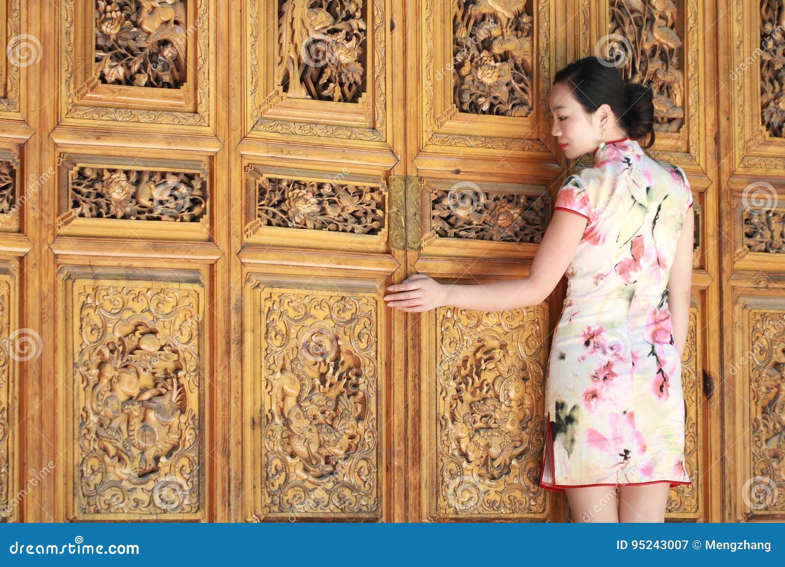 asian chinese girls wears cheongsam enjoy free time in ancient town