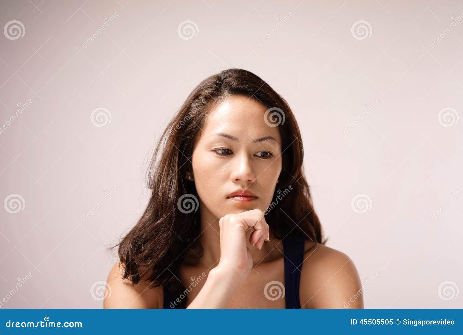 Asian Chinese Lady in Deep Thought with Pink Background Stock ...