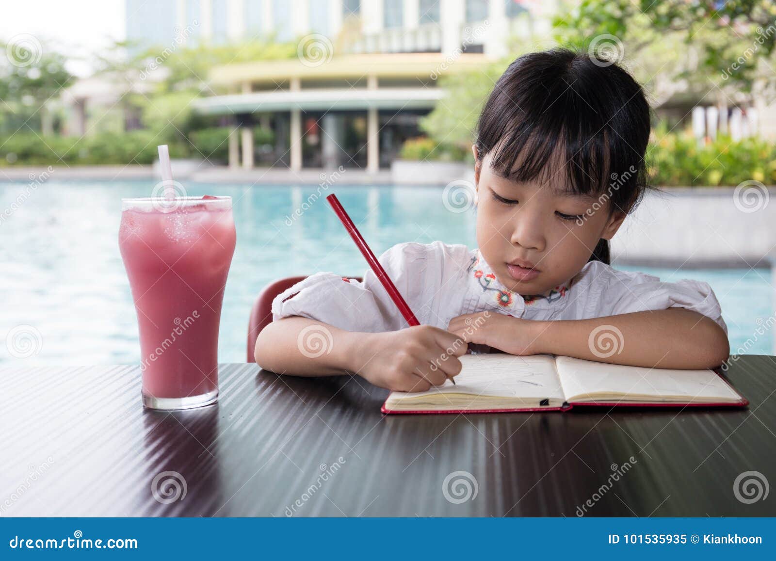 chinese restaurant kid doing homework