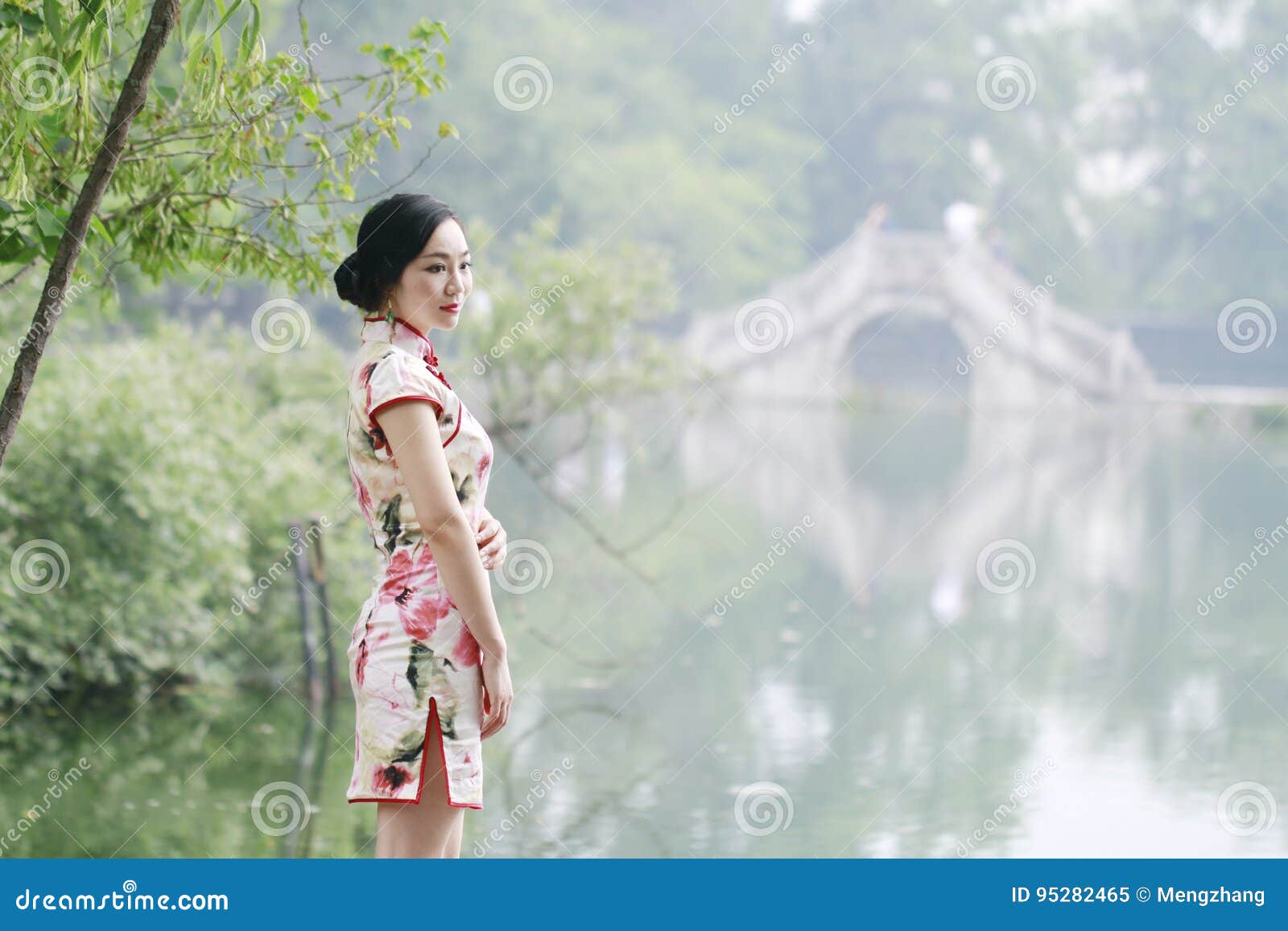 asian chinese woman in traditional cheongsam